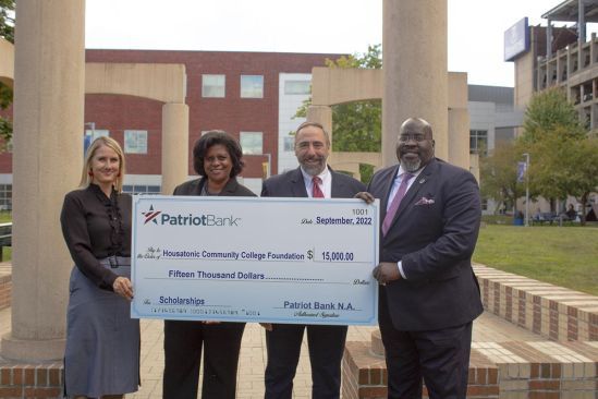 left to right, Kristy Jelenik, Patriot Bank EVP, Chief Compliance, Risk and CRA Officer Judith Corprew, CEO and Patriot Bank President Rob Russell, and HCC CEO Dr. Dwayne Smith.